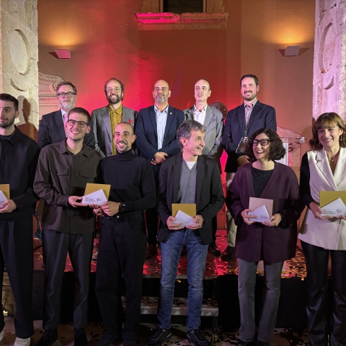 Foto de grup dels guardonats amb els organitzadors, patrocinadors i col·laboradors